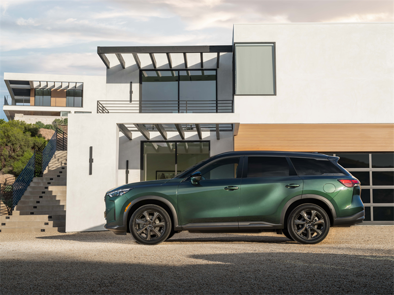 2027 INFINITI QX60 side angle parked in driveway